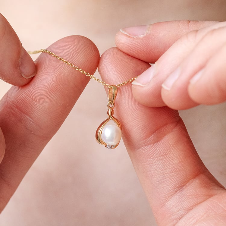 Zlatý přívěsek s perlou a zirkonem Ravil 121354