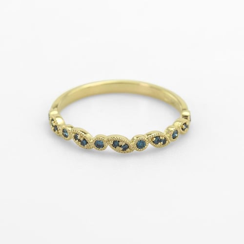 Modré diamanty ve zlatém eternity prstenu Sango