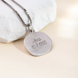 Zlatý přívěsek se symboly znamení zvěrokruhu Blíženci