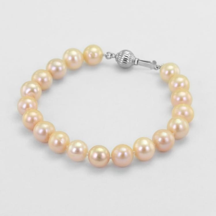 Stříbrný náramek s perlami 50914