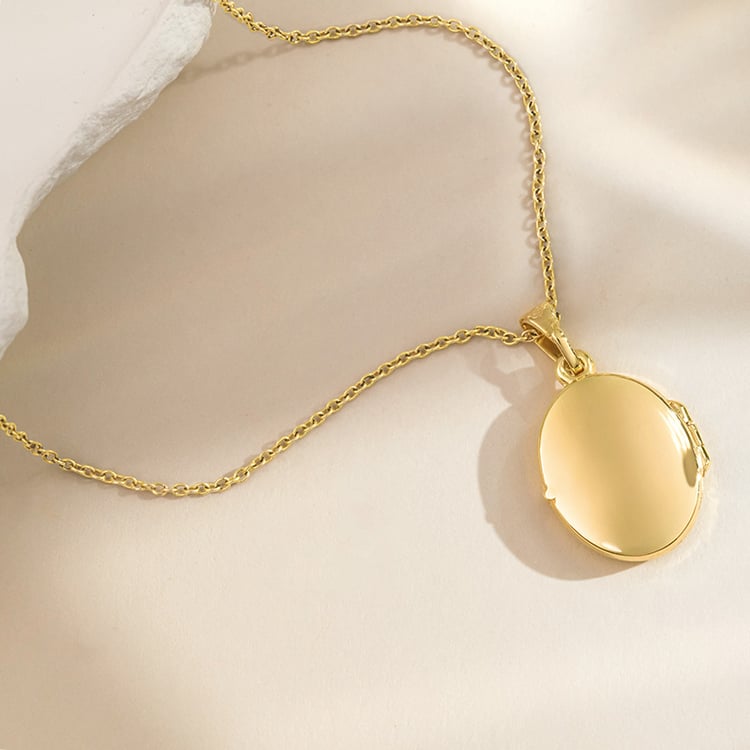 Oválný otevírací medailon ze stříbra 156350