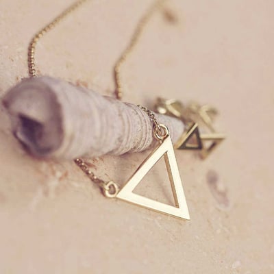 Zlatá kolekce ve tvaru trojúhelníku