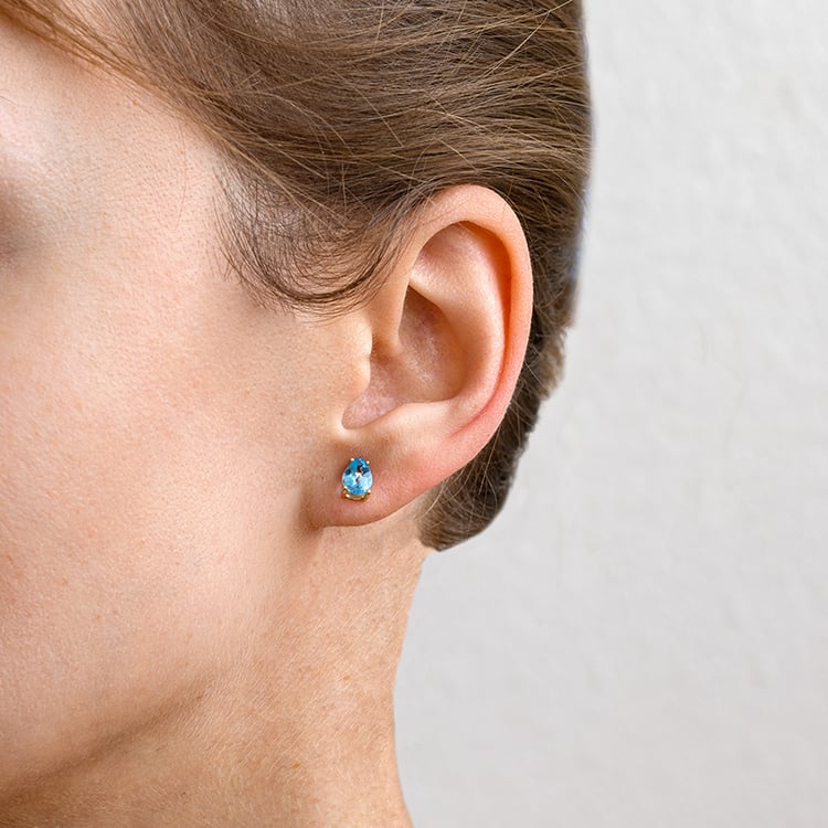 Topazové slzy ve zlatých náušnicích Reata 133766