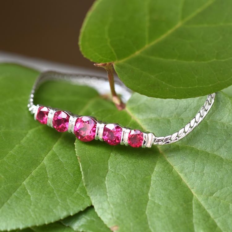 Stříbrný náramek s rubíny Darcell 46086