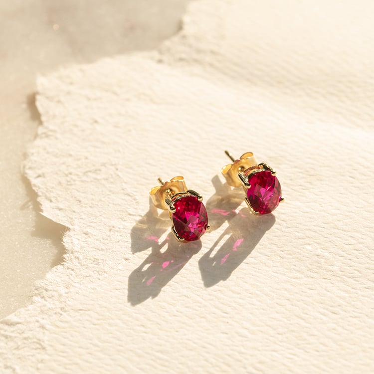 Zlaté náušnice s oválnými rubíny Qati 137989