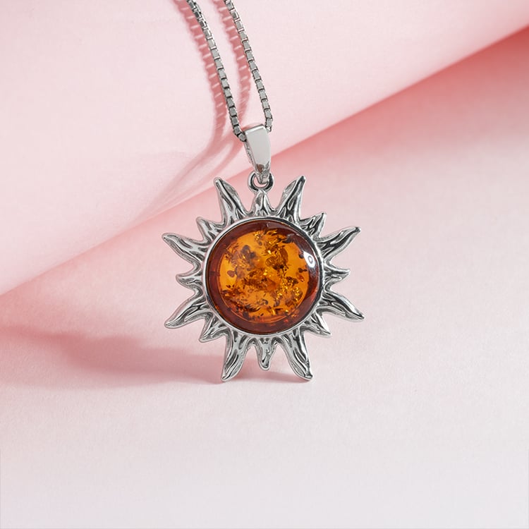 Stříbrný jantarový přívěsek ve tvaru slunce 150714
