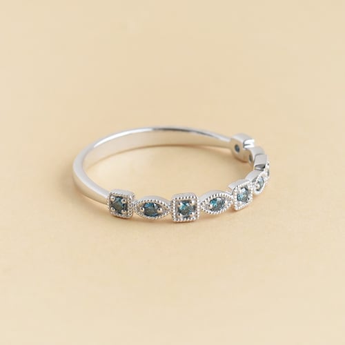 Zlatý eternity prsten s modrými diamanty Sanel
