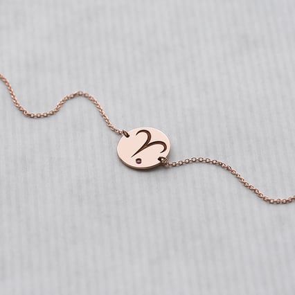 Zlatý náramek se znamením a rubínem Beran