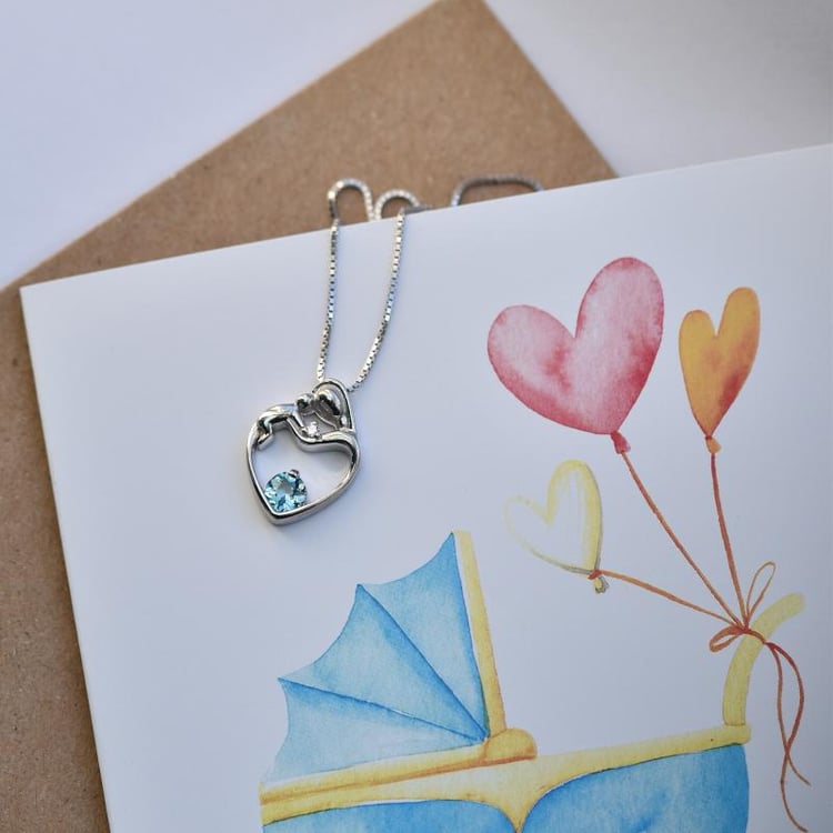 Přívěsek matka a dítě se švýcarským topazem a diamantem Ella 146324