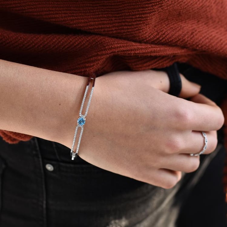 Stříbrný náramek s modrým topazem 50973