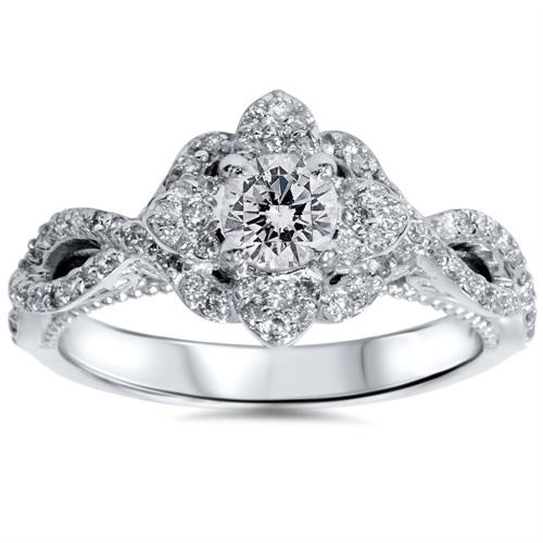 Zlatý zásnubní prsten s diamanty a safíry 4574