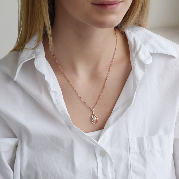 Stříbrný přívěsek s perlou a zirkony 90804