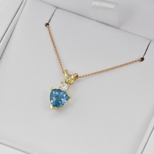 Zlatý přívěsek s topazem a diamantem Dorevie