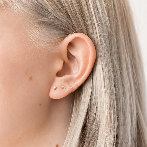 Zlatá piercing náušnice s bílými topazy Masha