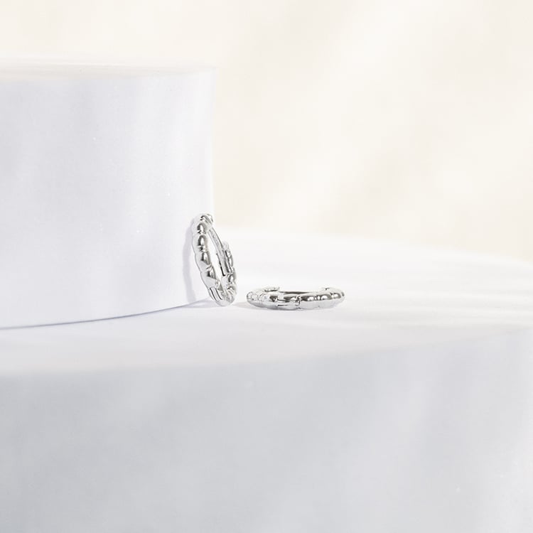 Kruhové propletené náušnice ze stříbra Torcy 142685