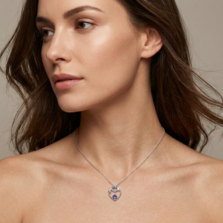 Reduce the size of the necklace in the photo by exactly 75 % while keeping its shape, proportions, texture, lighting, reflections, shadows, and position naturally consistent with the image. Do not alter anything else in the photo — keep the person, skin, clothing, background, colors, composition, camera angle, lighting, and image quality completely unchanged. The edit should look realistic and seamless, as if the smaller necklace was originally photographed that way. 168746