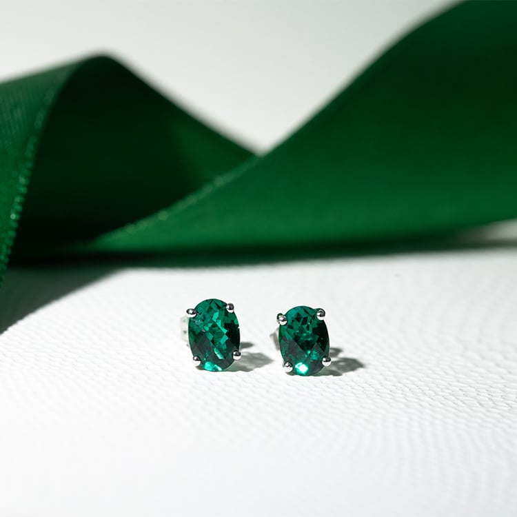 Zlaté náušnice s oválnými smaragdy Qati 130468