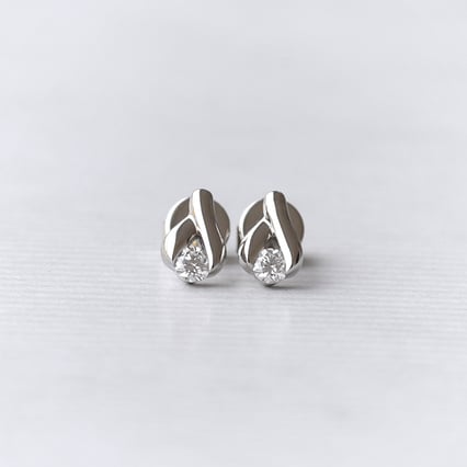 Platinové náušnice s 0.22ct diamanty Fox