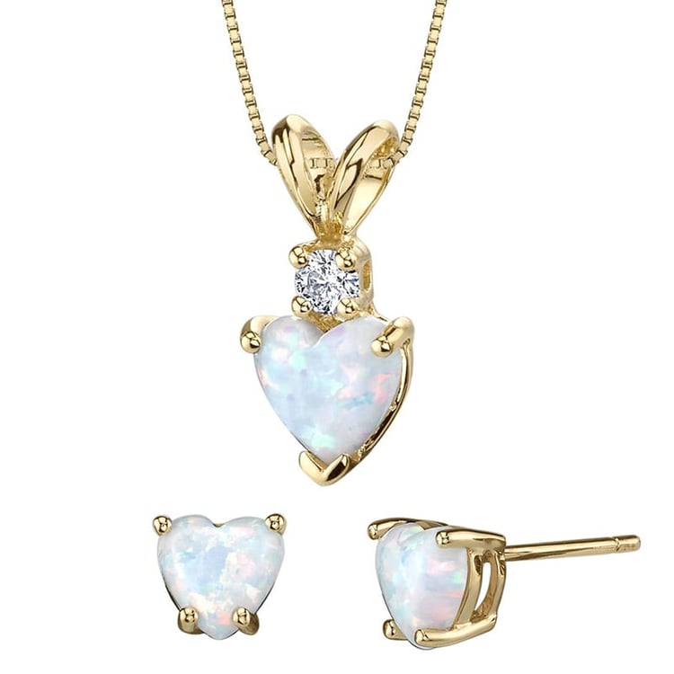 Bílá opálová srdíčka ve zlaté kolekci šperků Kajsa 25343