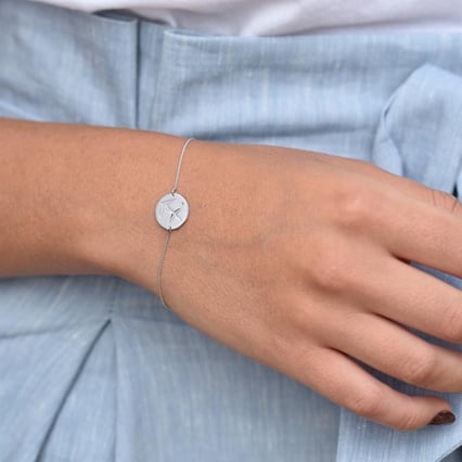 Zlatý náramek se znamením a olivínem Střelec