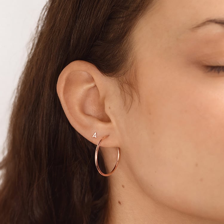 Zlatá náušnice s písmenem Alphabet 153200