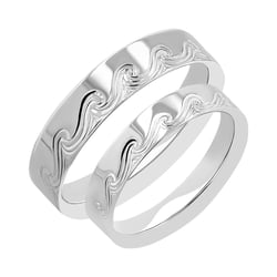 Snubní prsteny s ruční rytinou vln Carlin