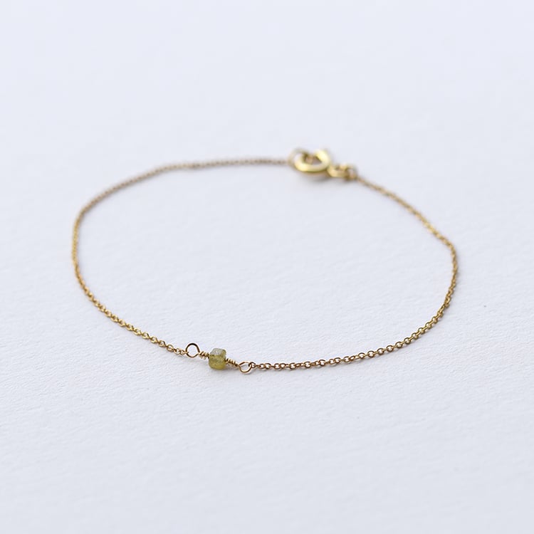 Náramek se žlutou diamantovou kostkou 62192