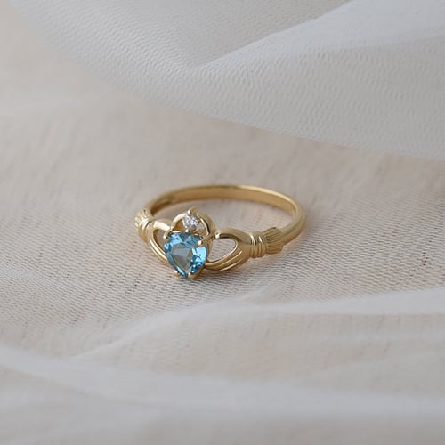 Zlatý claddagh prsten s topazem a diamantem Norie