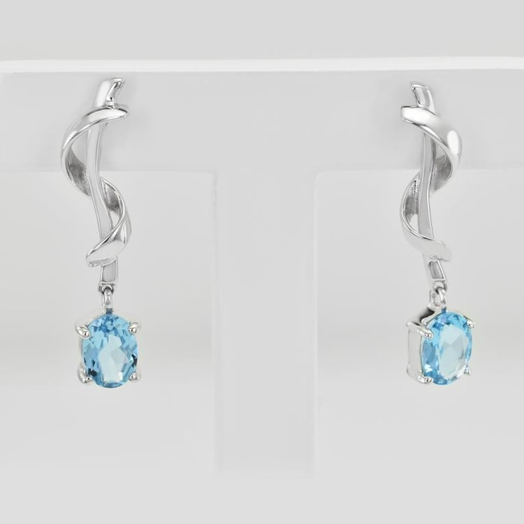 Stříbrné náušnice s oválnými topazy 25102