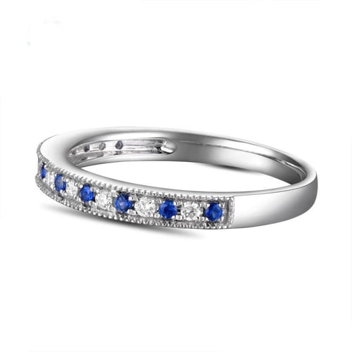 Zlatý eternity prsten se safíry a diamanty Deniece