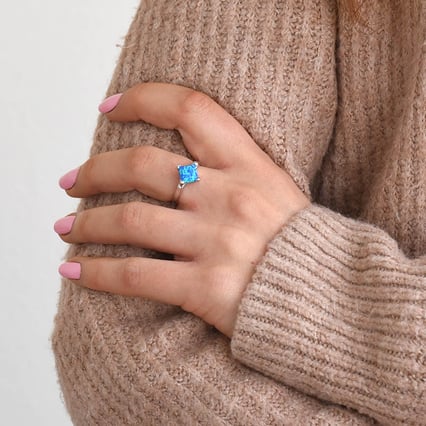 Opálový stříbrný prsten plný barev oceánu Neola