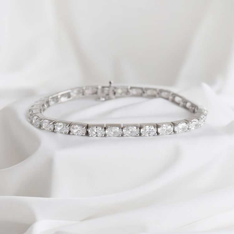 Stříbrný náramek se zirkony 90693