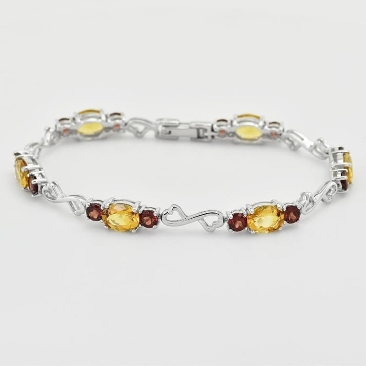 Stříbrný náramek s granáty 6299