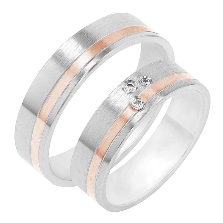 Decentní snubní prsteny se třemi diamanty