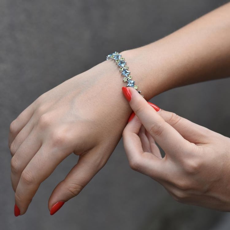 17.5ct stříbrný náramek s topazy a olivíny 44738