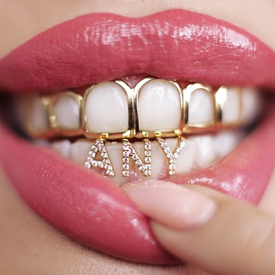 Zlaté grillz s diamanty