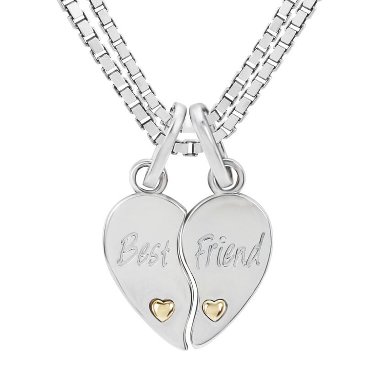 Dvě poloviny stříbrných srdcí s nápisem Best Friend