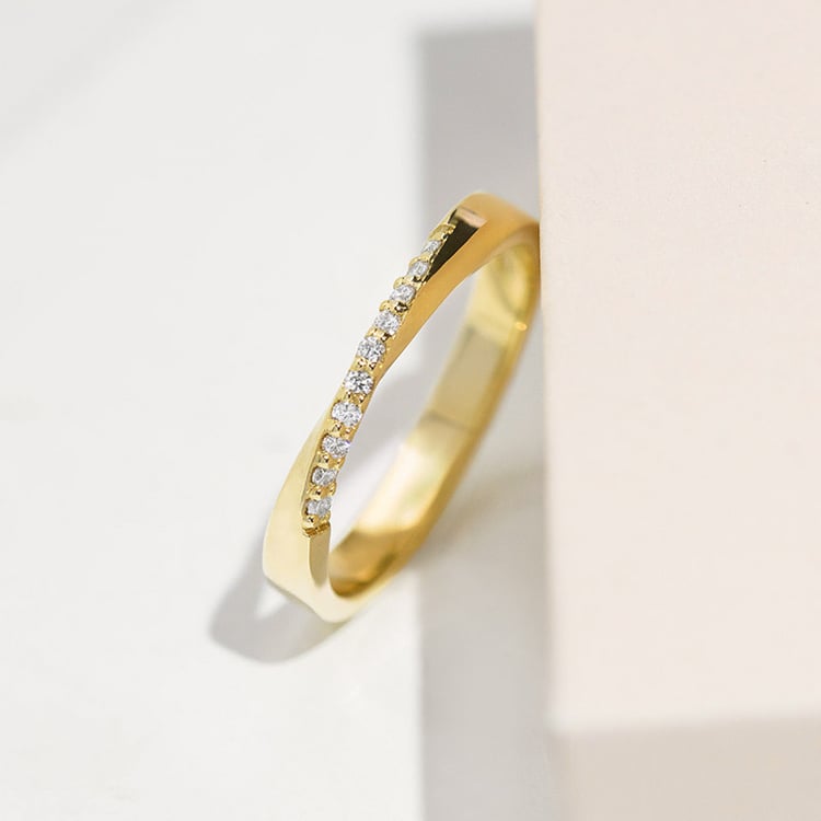 Zlaté propletené snubní prsteny s diamanty Brielle 154453