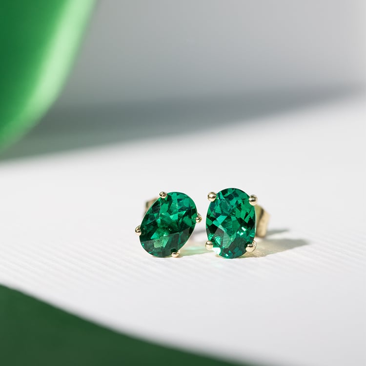 Zlaté náušnice s oválnými smaragdy Qati 121891