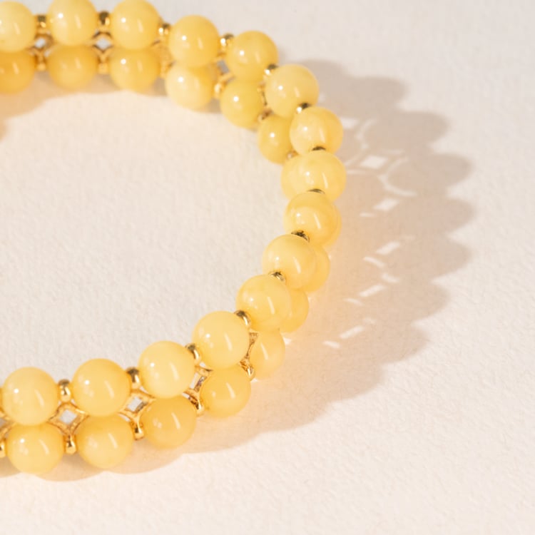 Stříbrný pozlacený náramek s krémově žlutými jantary Milania 101120