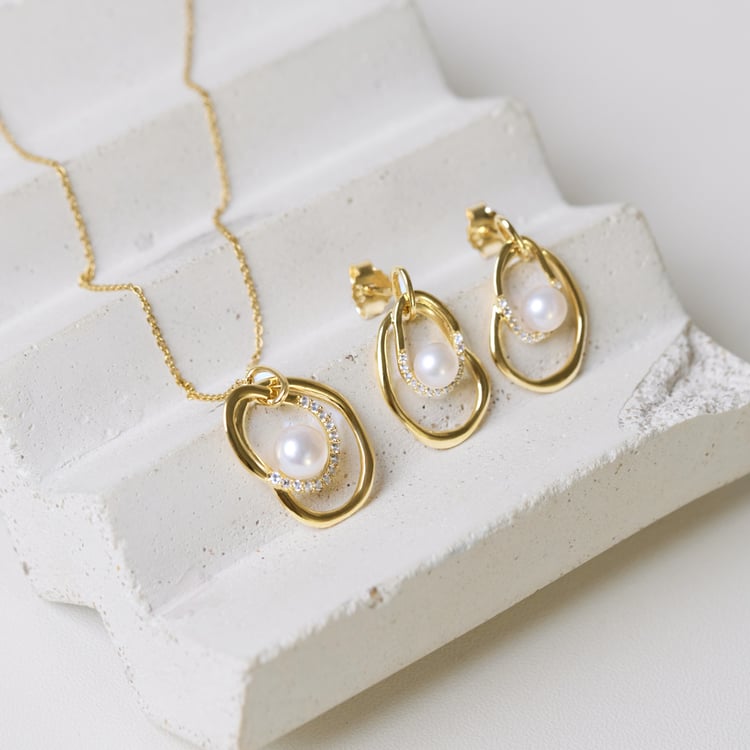 Kolekce stříbrných šperků s perlami a bílými topazy 164102