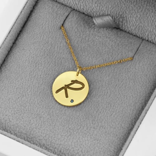 Zlatý přívěsek s modrým diamantem a gravírem písmene Sager